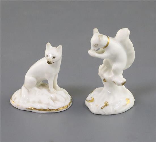 Two Rockingham porcelain toy figures of a squirrel and a foxhound, c.1830, H. 5.1cm and 4cm, chips to ears